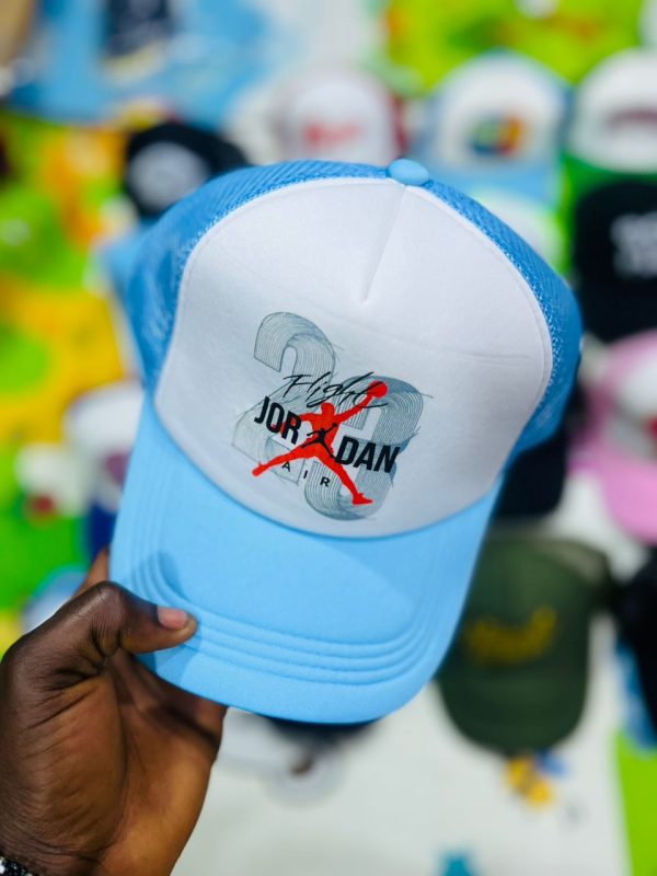IMG-20260622-WA0097 Air Jordan 23 Premium Mesh Trucker Cap – Sky Blue & White